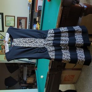 Beautiful black and lace dress by Eva Franco size 8